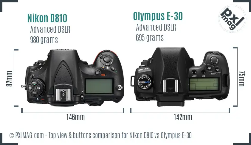 Nikon D810 vs Olympus E-30 top view buttons comparison