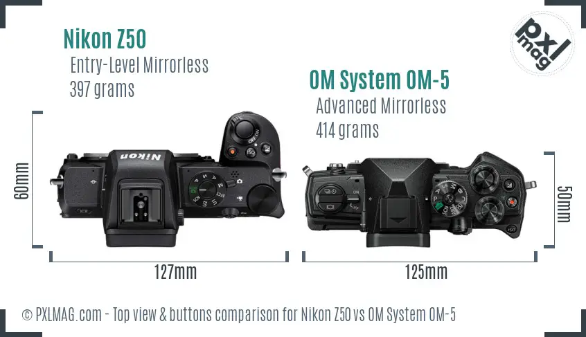 Nikon Z50 vs OM System OM-5 top view buttons comparison Nikon Z50 vs OM System OM-5 top view buttons comparison