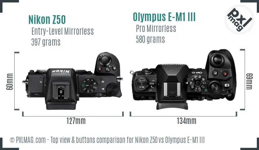 Nikon Z50 vs Olympus E-M1 III top view buttons comparison