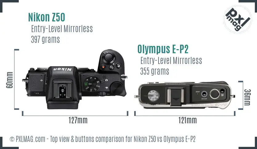 Nikon Z50 vs Olympus E-P2 top view buttons comparison