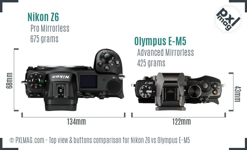 Nikon Z6 vs Olympus E-M5 top view buttons comparison