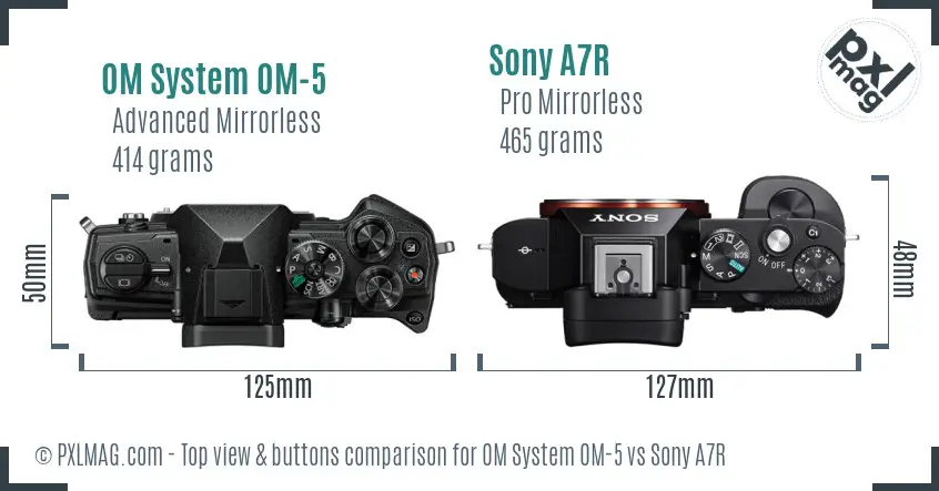 OM System OM-5 vs Sony A7R top view buttons comparison