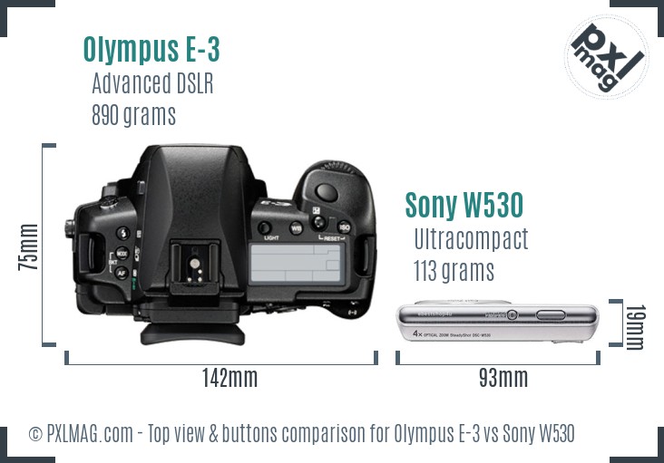Olympus E-3 vs Sony W530 top view buttons comparison