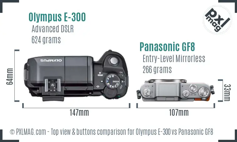 Olympus E-300 vs Panasonic GF8 top view buttons comparison