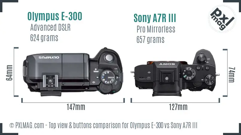 Olympus E-300 vs Sony A7R III top view buttons comparison