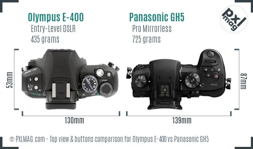 Olympus E-400 vs Panasonic GH5 top view buttons comparison