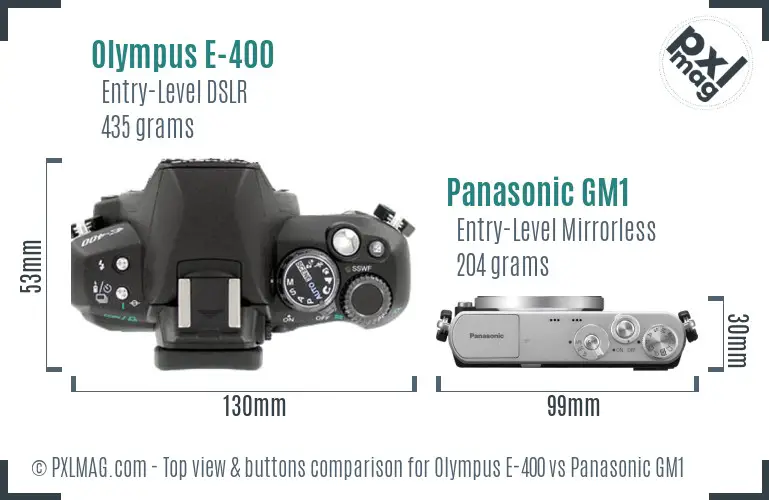 Olympus E-400 vs Panasonic GM1 top view buttons comparison