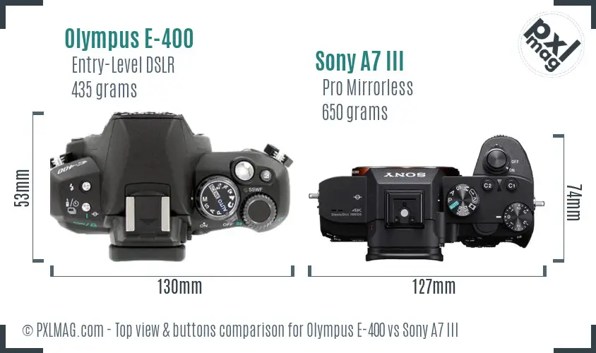 Olympus E-400 vs Sony A7 III top view buttons comparison