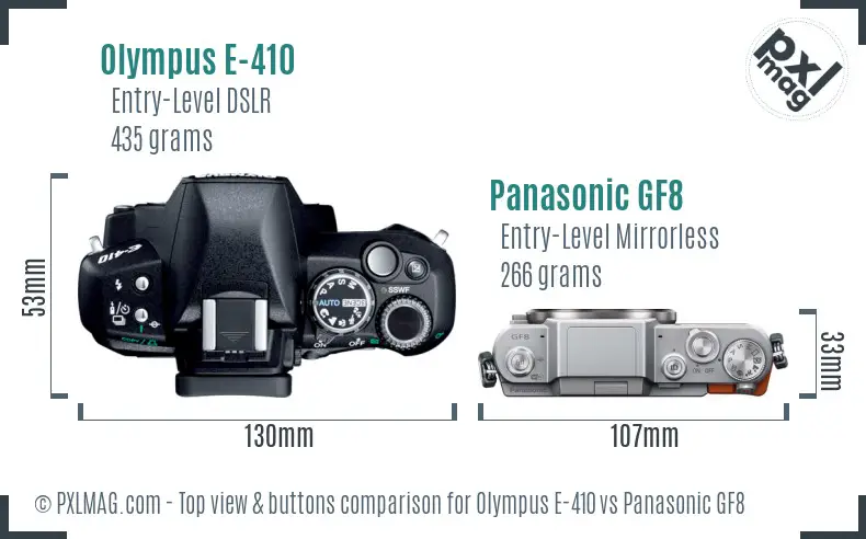 Olympus E-410 vs Panasonic GF8 top view buttons comparison Olympus E-410 vs Panasonic GF8 top view buttons comparison
