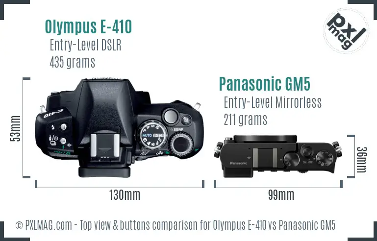 Olympus E-410 vs Panasonic GM5 top view buttons comparison