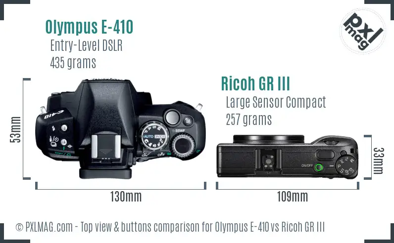 Olympus E-410 vs Ricoh GR III top view buttons comparison