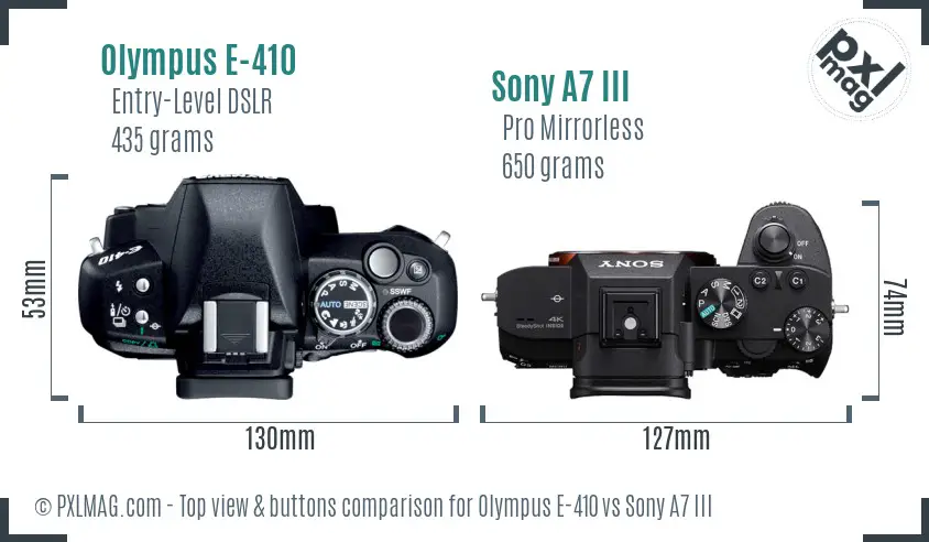 Olympus E-410 vs Sony A7 III top view buttons comparison