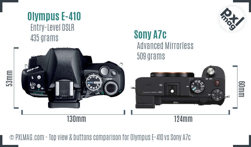 Olympus E-410 vs Sony A7c top view buttons comparison