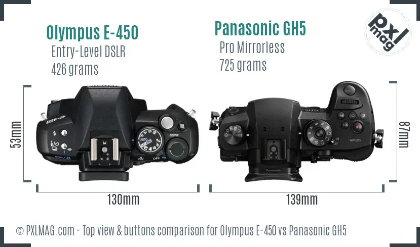 Olympus E-450 vs Panasonic GH5 top view buttons comparison