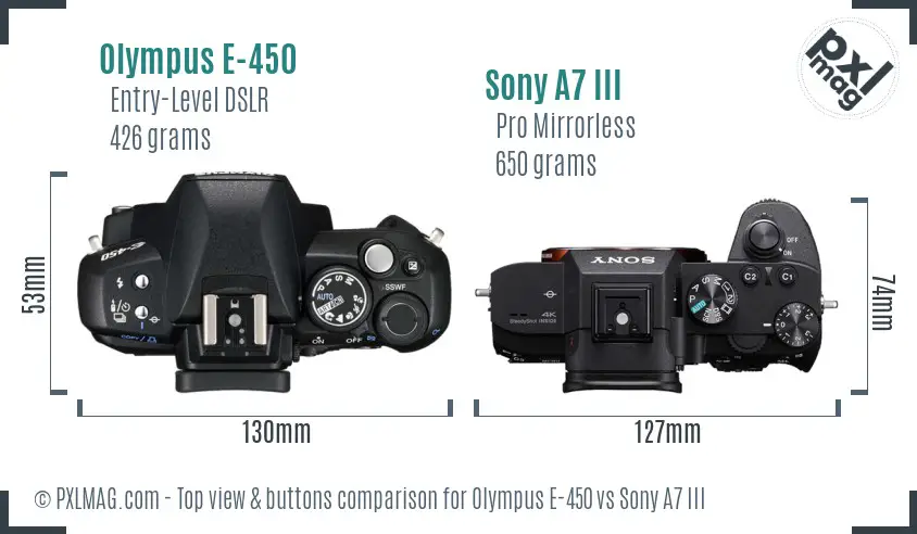 Olympus E-450 vs Sony A7 III top view buttons comparison