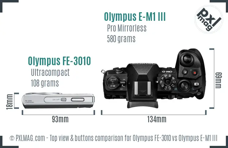 Olympus FE-3010 vs Olympus E-M1 III top view buttons comparison