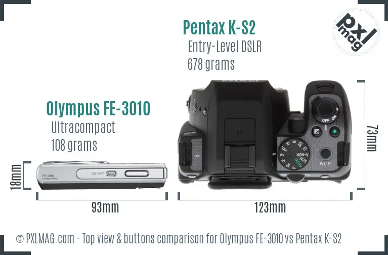 Olympus FE-3010 vs Pentax K-S2 top view buttons comparison