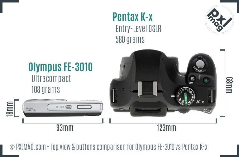 Olympus FE-3010 vs Pentax K-x top view buttons comparison