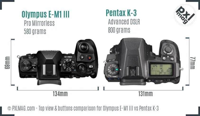 Olympus E-M1 III vs Pentax K-3 top view buttons comparison