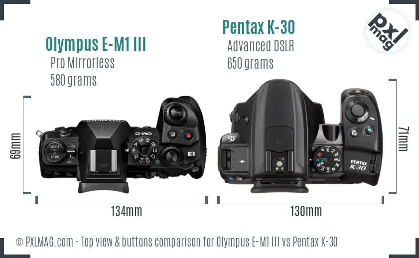Olympus E-M1 III vs Pentax K-30 top view buttons comparison