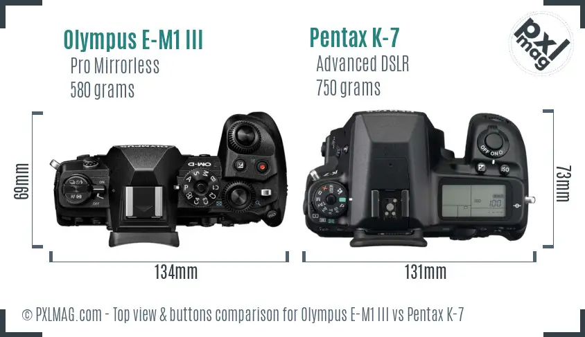 Olympus E-M1 III vs Pentax K-7 top view buttons comparison
