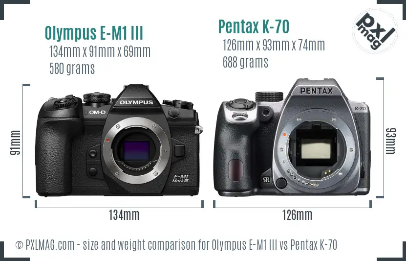 Olympus E-M1 III vs Pentax K-70 size comparison