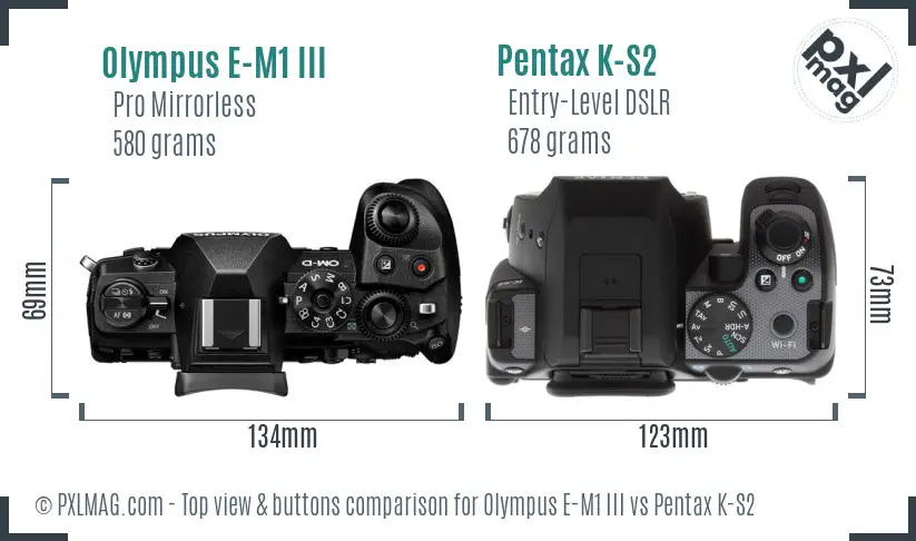 Olympus E-M1 III vs Pentax K-S2 top view buttons comparison