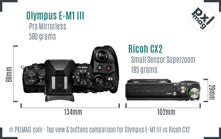 Olympus E-M1 III vs Ricoh CX2 top view buttons comparison