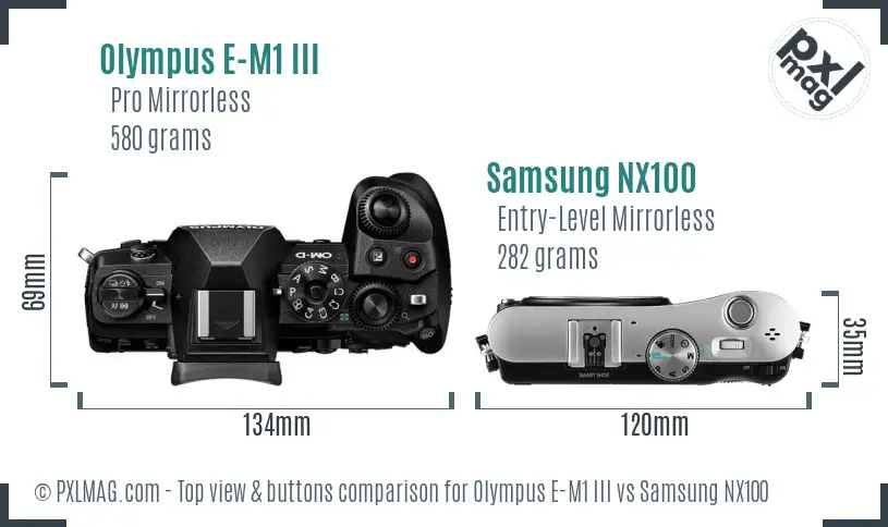 Olympus E-M1 III vs Samsung NX100 top view buttons comparison Olympus E-M1 III vs Samsung NX100 top view buttons comparison