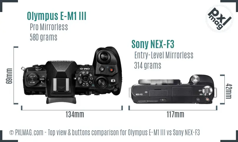 Olympus E-M1 III vs Sony NEX-F3 top view buttons comparison