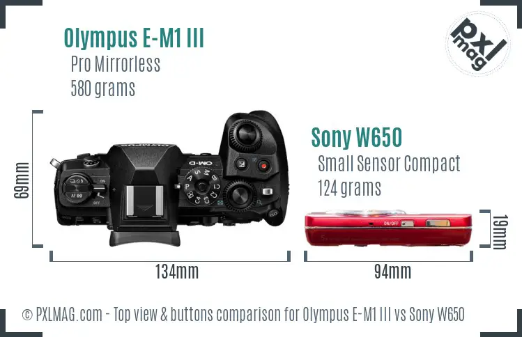 Olympus E-M1 III vs Sony W650 top view buttons comparison