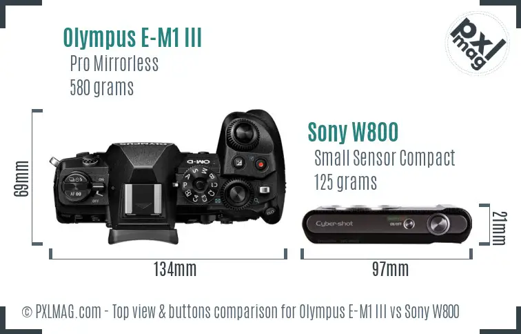 Olympus E-M1 III vs Sony W800 top view buttons comparison Olympus E-M1 III vs Sony W800 top view buttons comparison