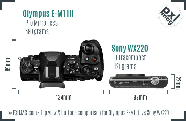 Olympus E-M1 III vs Sony WX220 top view buttons comparison