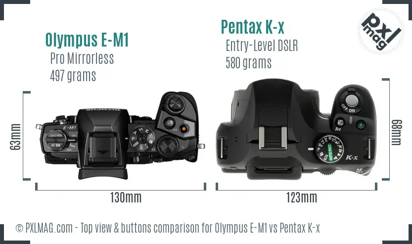 Olympus E-M1 vs Pentax K-x top view buttons comparison