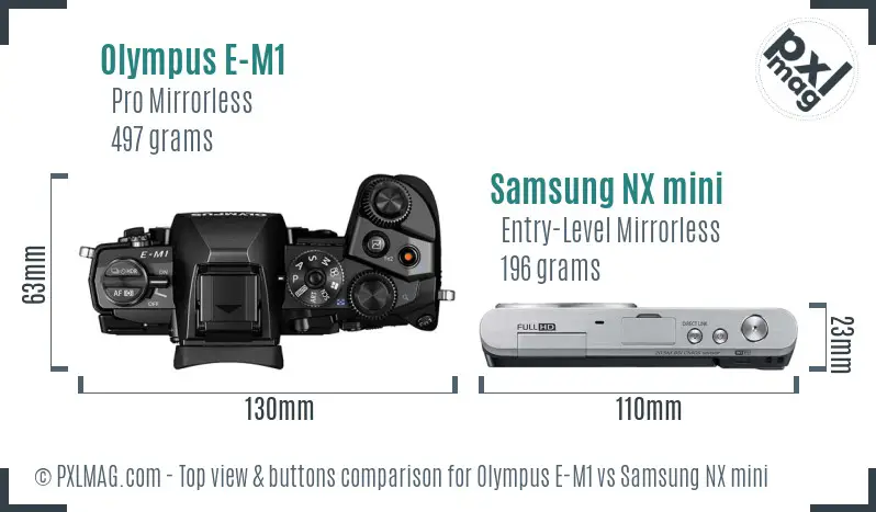 Olympus E-M1 vs Samsung NX mini top view buttons comparison