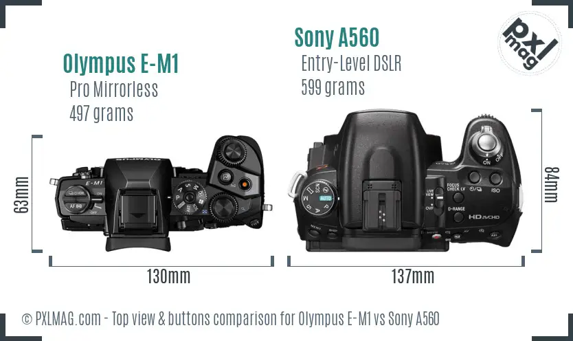 Olympus E-M1 vs Sony A560 top view buttons comparison