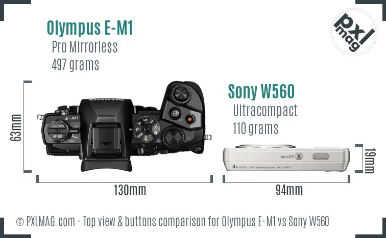 Olympus E-M1 vs Sony W560 top view buttons comparison