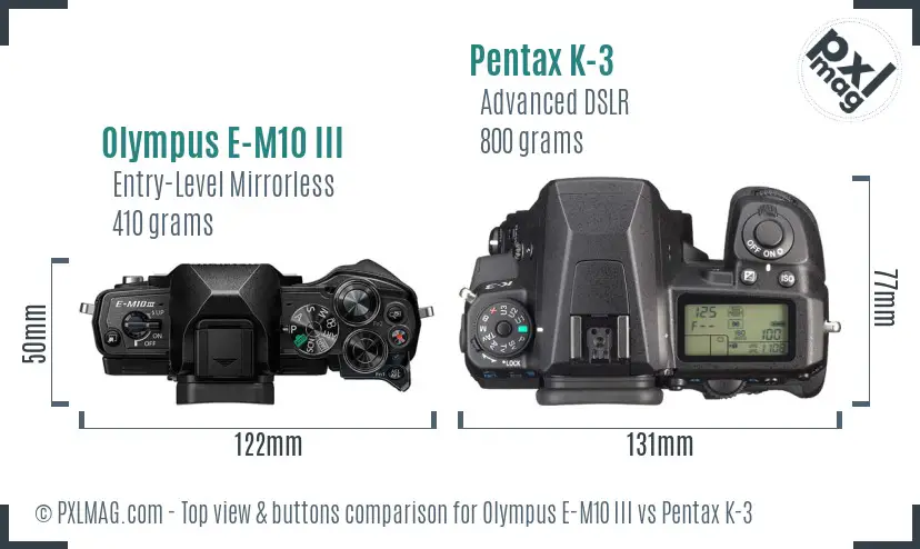 Olympus E-M10 III vs Pentax K-3 top view buttons comparison