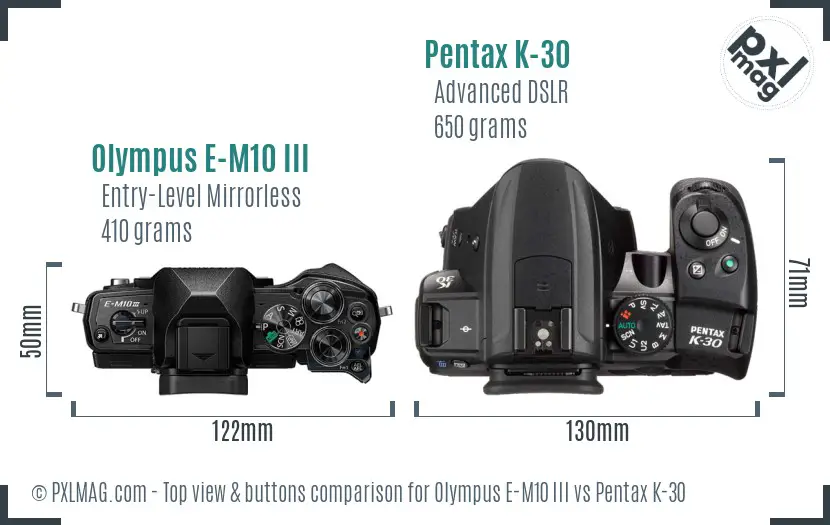 Olympus E-M10 III vs Pentax K-30 top view buttons comparison