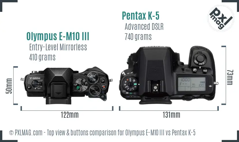 Olympus E-M10 III vs Pentax K-5 top view buttons comparison