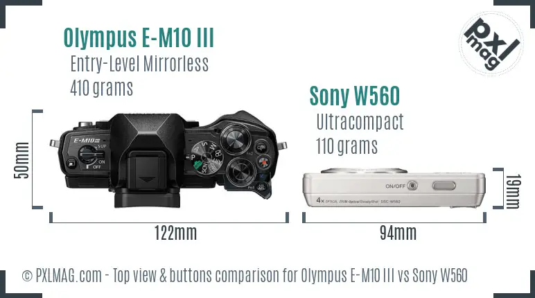 Olympus E-M10 III vs Sony W560 top view buttons comparison