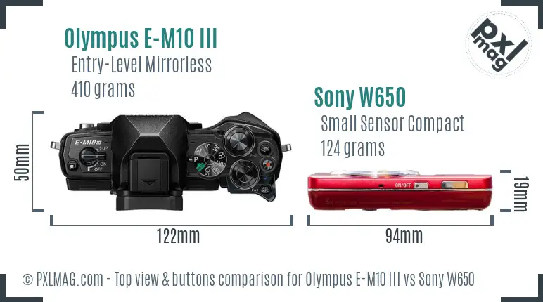 Olympus E-M10 III vs Sony W650 top view buttons comparison