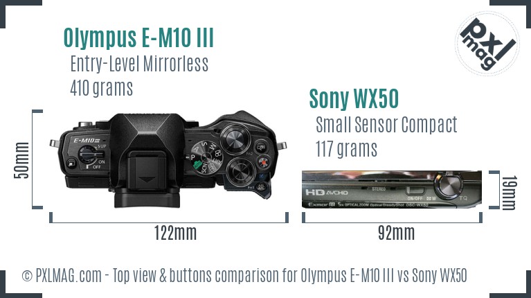 Olympus E-M10 III vs Sony WX50 top view buttons comparison