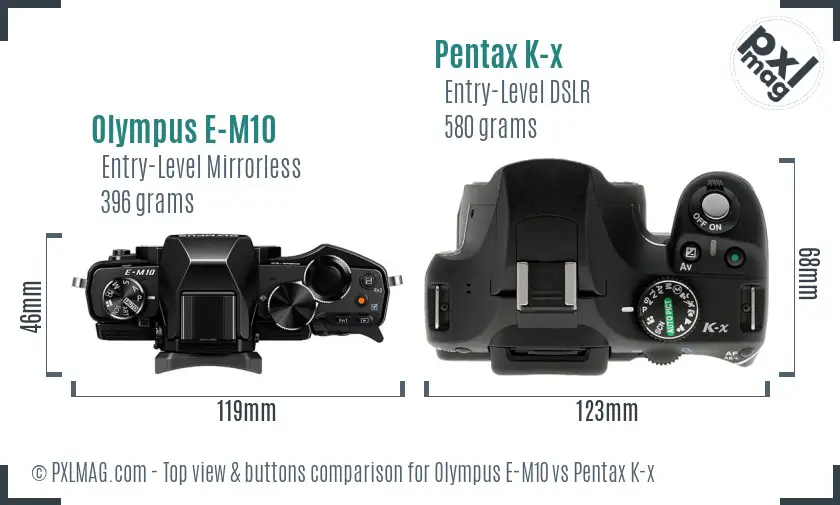Olympus E-M10 vs Pentax K-x top view buttons comparison