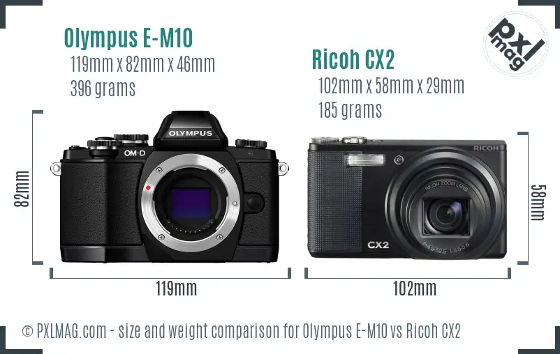 Olympus E-M10 vs Ricoh CX2 size comparison Olympus E-M10 vs Ricoh CX2 size comparison