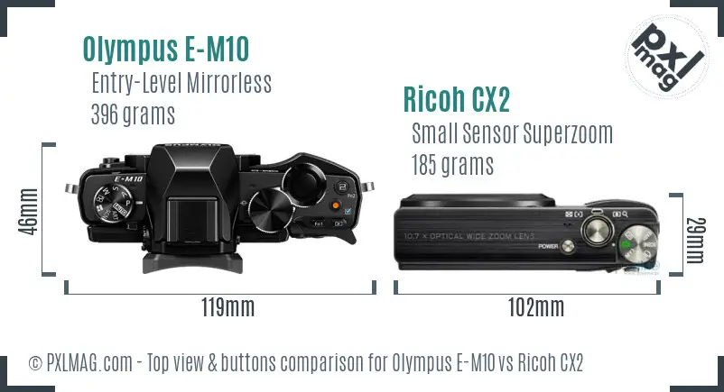 Olympus E-M10 vs Ricoh CX2 top view buttons comparison Olympus E-M10 vs Ricoh CX2 top view buttons comparison