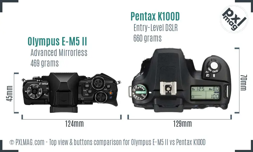 Olympus E-M5 II vs Pentax K100D top view buttons comparison