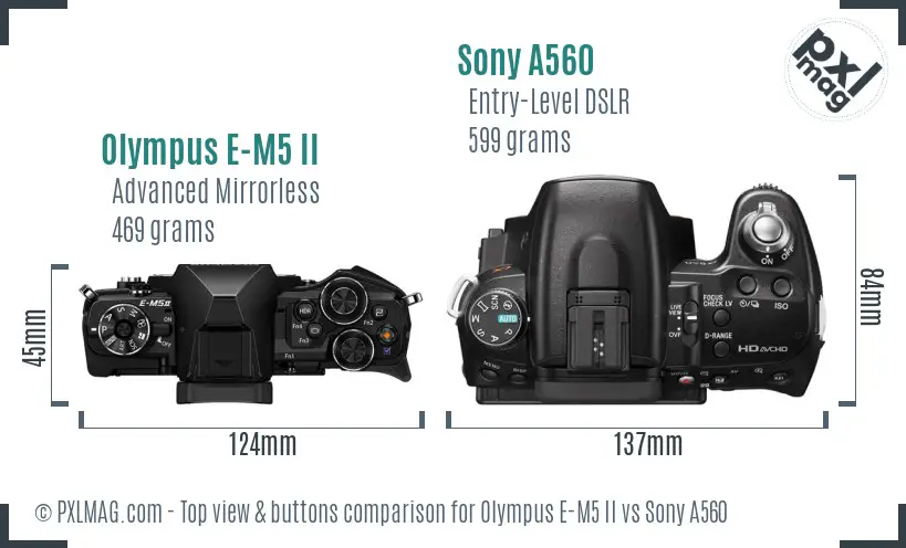 Olympus E-M5 II vs Sony A560 top view buttons comparison