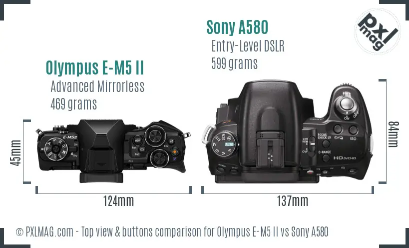 Olympus E-M5 II vs Sony A580 top view buttons comparison