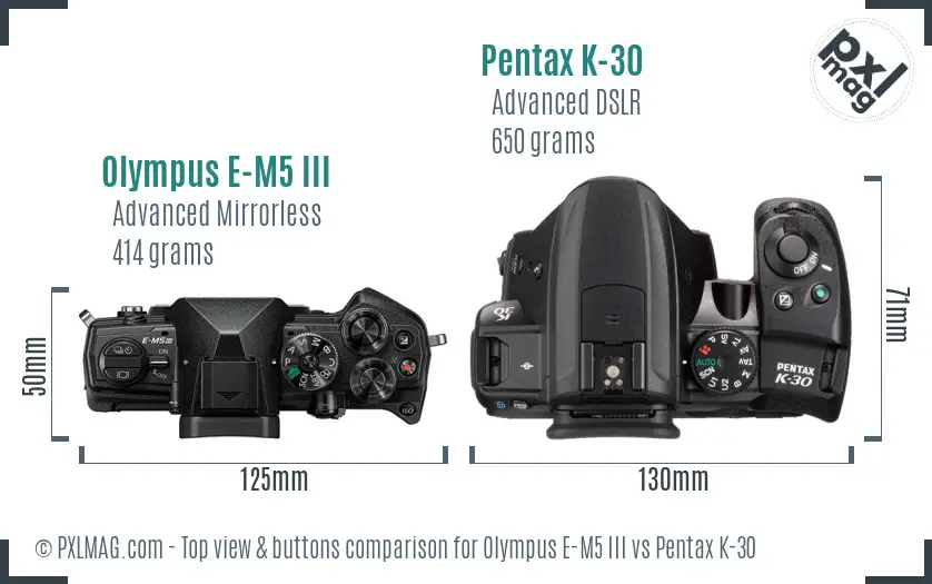 Olympus E-M5 III vs Pentax K-30 top view buttons comparison